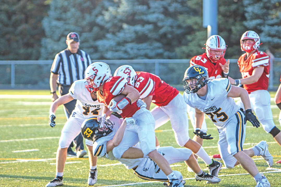 Lions dominate in football opener