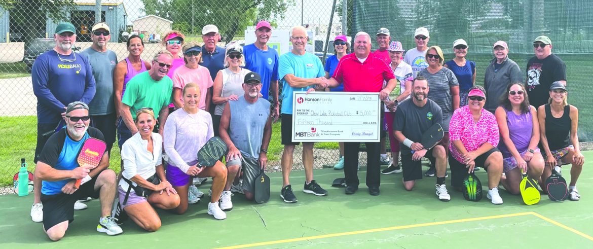 Pickleball Club presented with a check