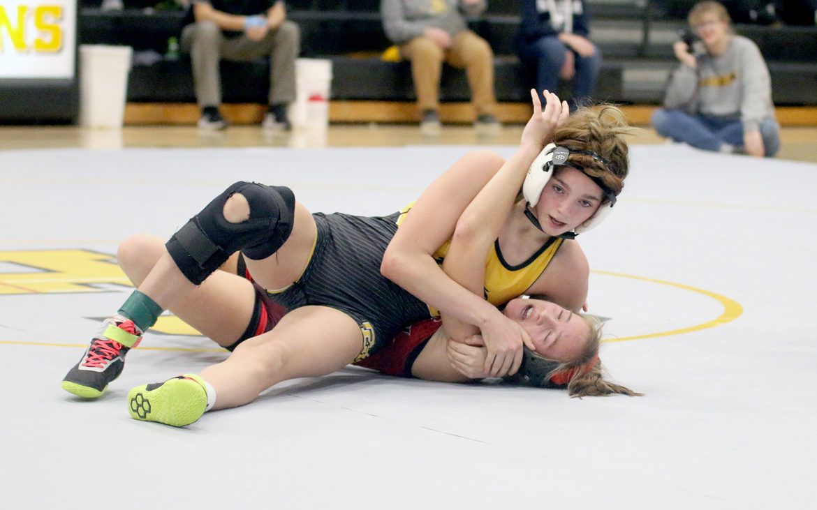 Lion girls dominate mat in  home face-off against Warhawks