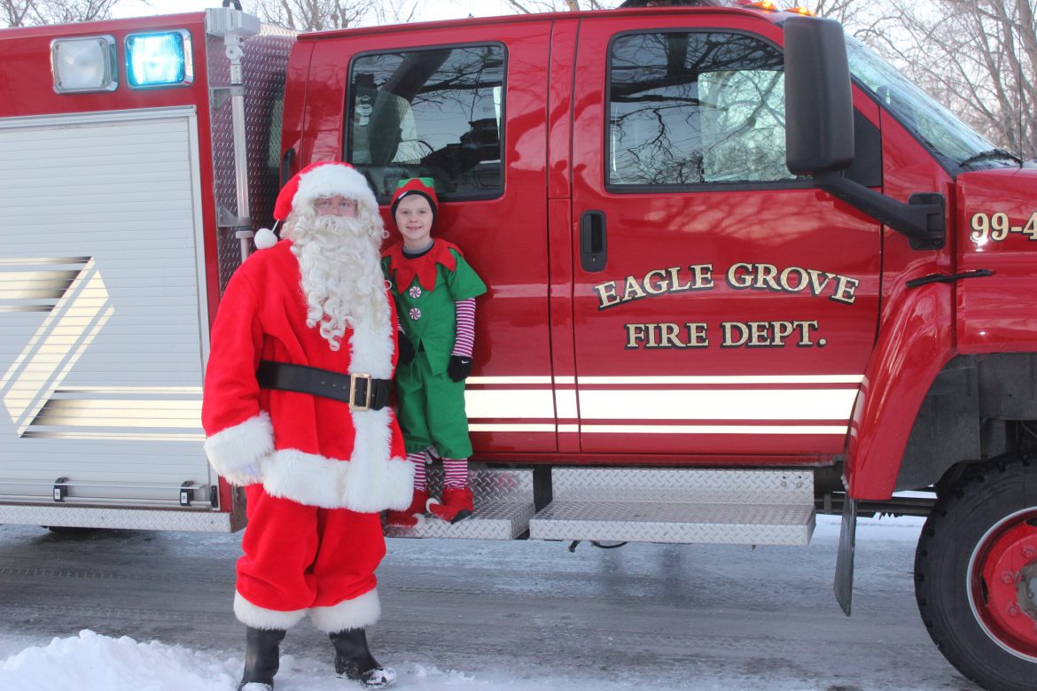 Firefighters Help Santa Visit Local Kids Safely