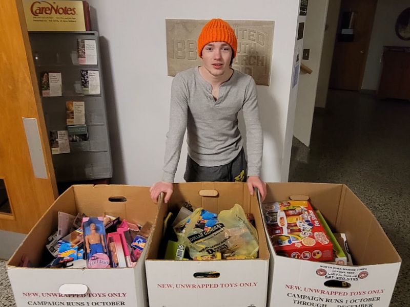 Determined Local Boy Scout Breaks Brother’s Toys For Tots Pushup Record