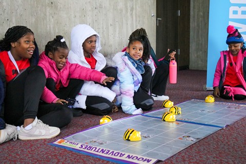 4-H members code Bee-Bots.