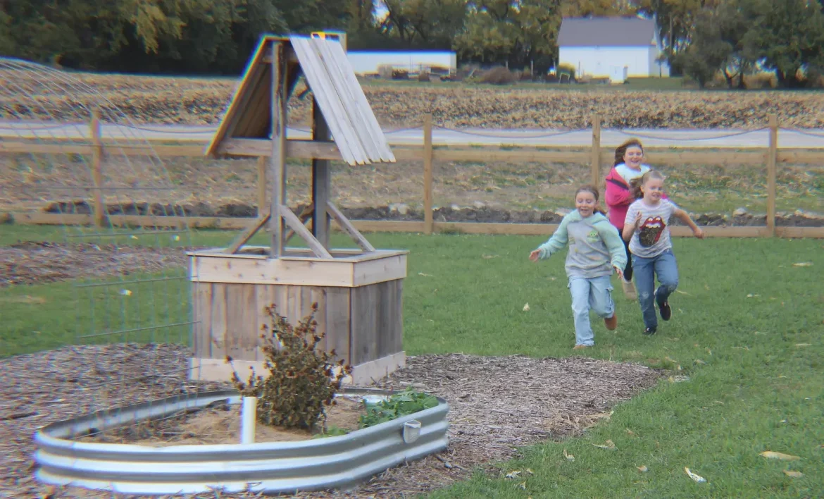 First Harvest Draws A Crowd to New Community Garden