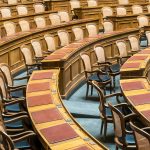 brown wooden chairs on blue and brown wooden floor