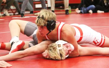 Kash Wooge starts out a 3-0 night with a pin over St. Ansgar’s Hayden Warrington last Thursday, Jan. 15 during a quad in Forest City.