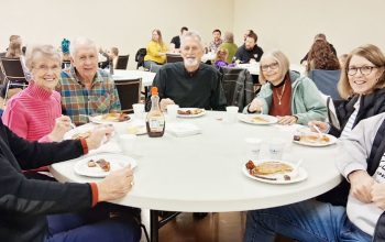 The Buffalo Center Fire Department continued a springtime tradition on Saturday, Apr. 4, with the annual Pancake Day held the day before Easter at the Heritage Town Center. The meal serves as a fundraiser for Buffalo Center’s 4th of July fireworks display. Members of the Pilgrim family enjoying their meal include, from left: Steve Pilgrim, Vonnie and Ray Bosma, Doug Pilgrim, Jan Pilgrim, Sheila Pilgrim, and Tom Pilgrim.
