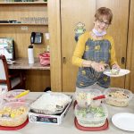 Monica Tyler serves salads during the salad luncheon provided by Valero.