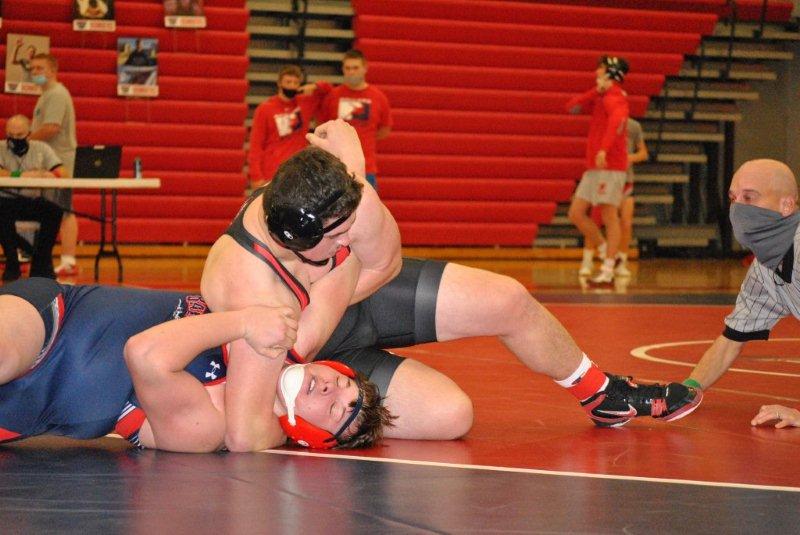 Cowboy wrestlers take win at Ballard