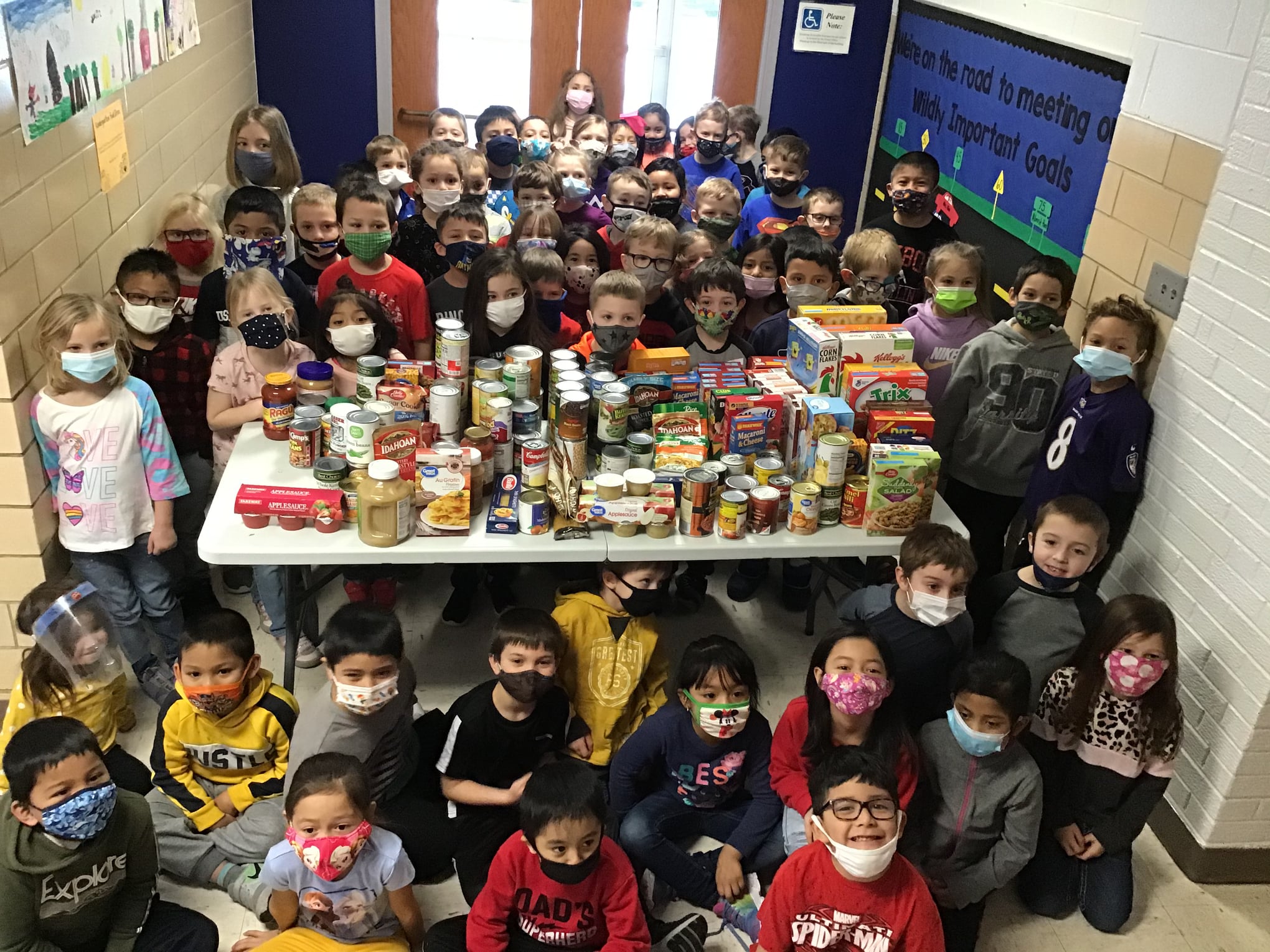 Kindergarteners collect over 100 food pantry items to celebrate 100 days of school