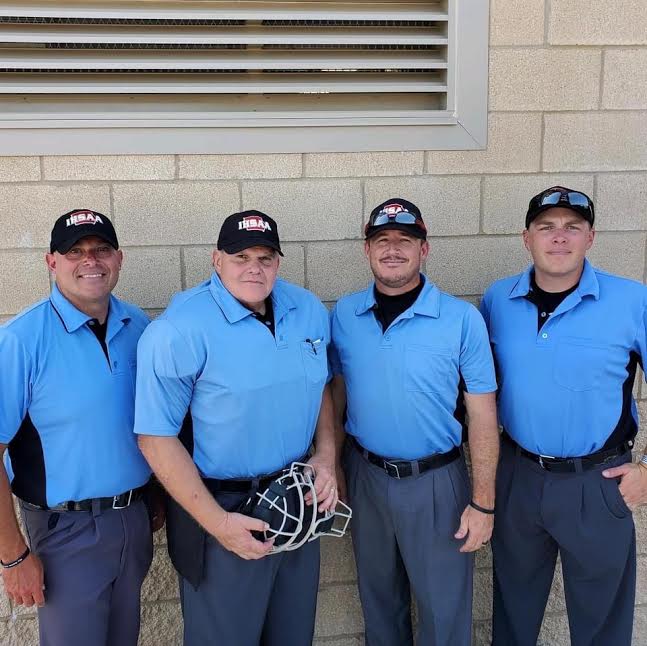 In his sixth year as an umpire, Jason Berning works first state tournament