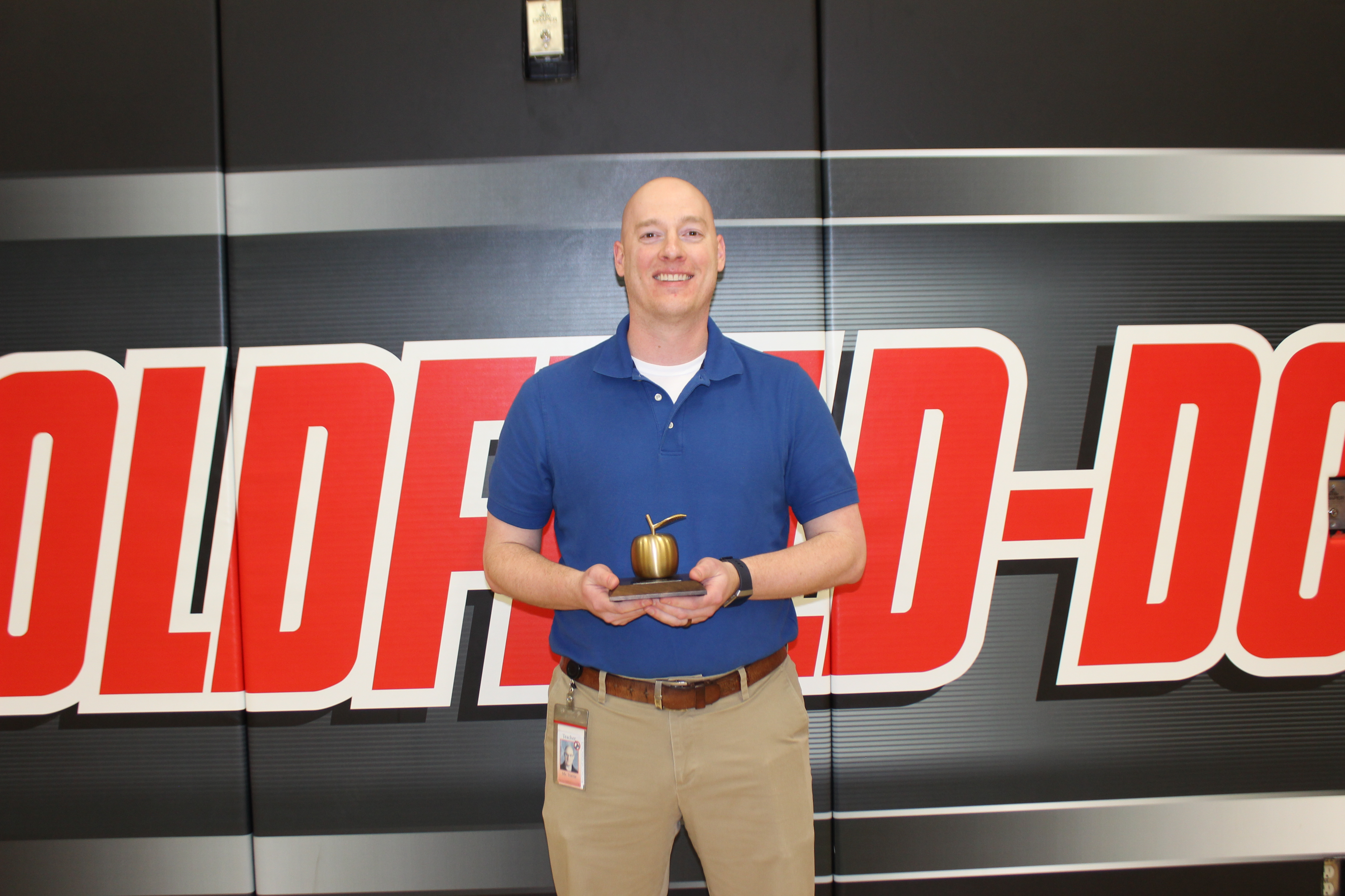 CGD Middle School teacher honored as Golden Apple winner