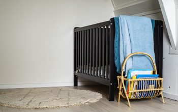 blue textile on brown wooden chair